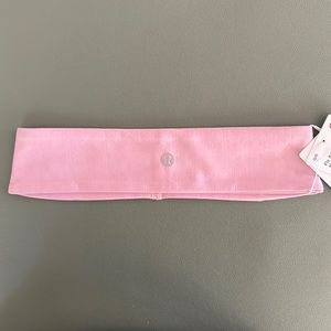 NWT Lululemon Fly Away Tamer Headband in pink